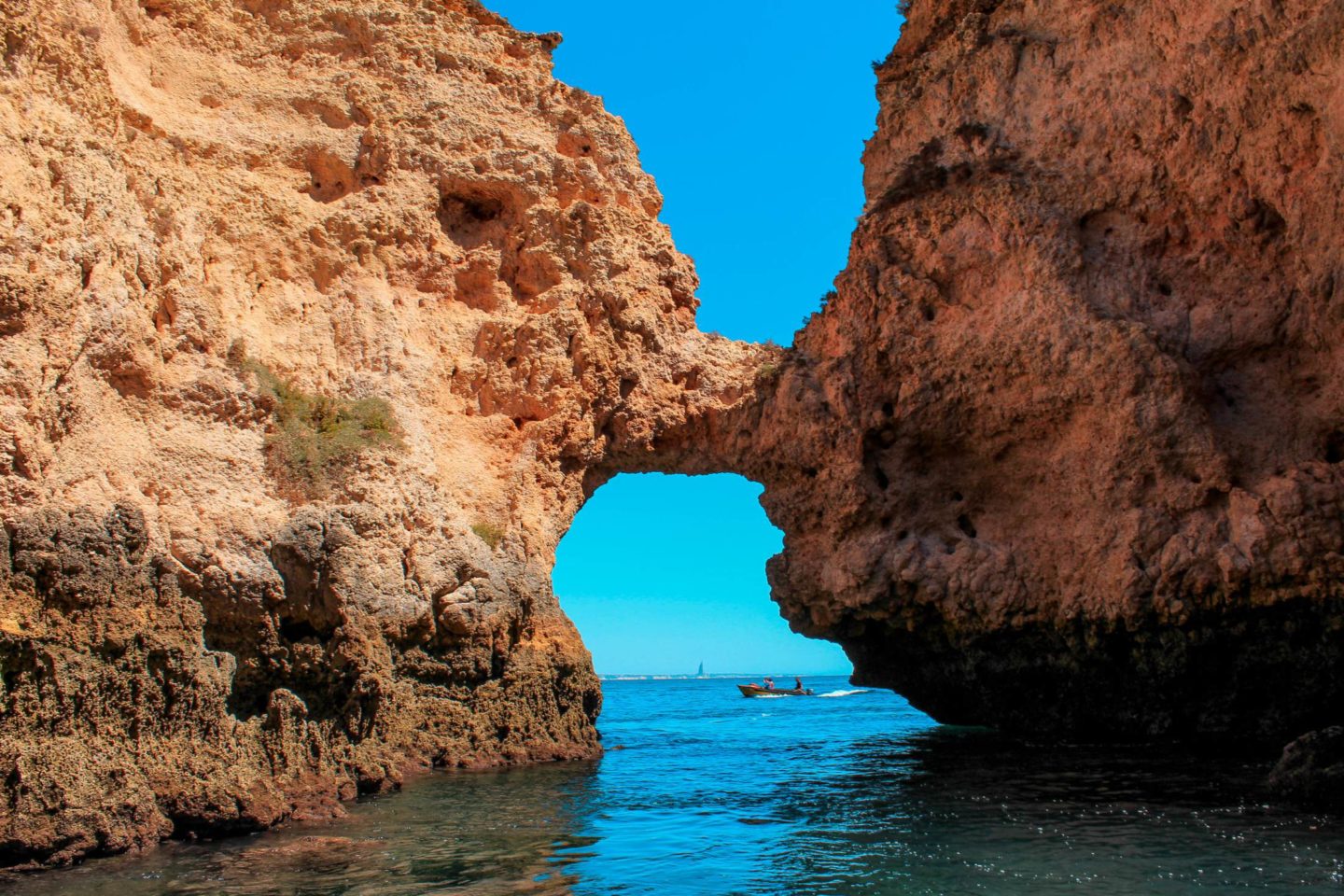 lagos portugal caves looking like an over water bridge